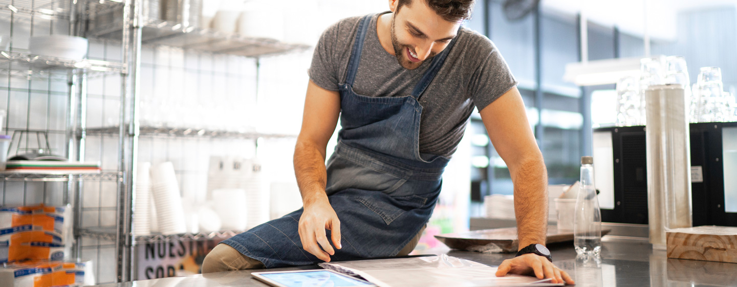 Business owner checks his paperwork.