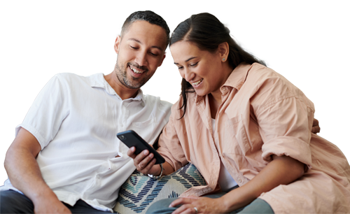 Woman and man looking at a phone together