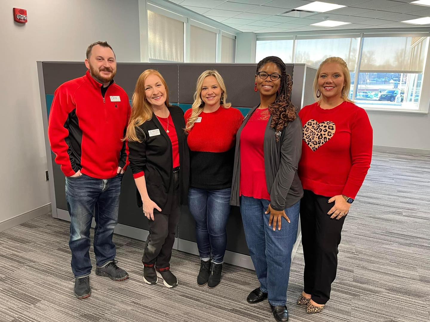 Marketing team wearing red