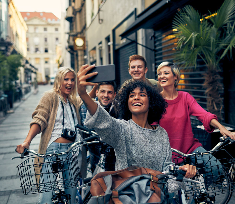 Group of friends pose for a photo on vacation