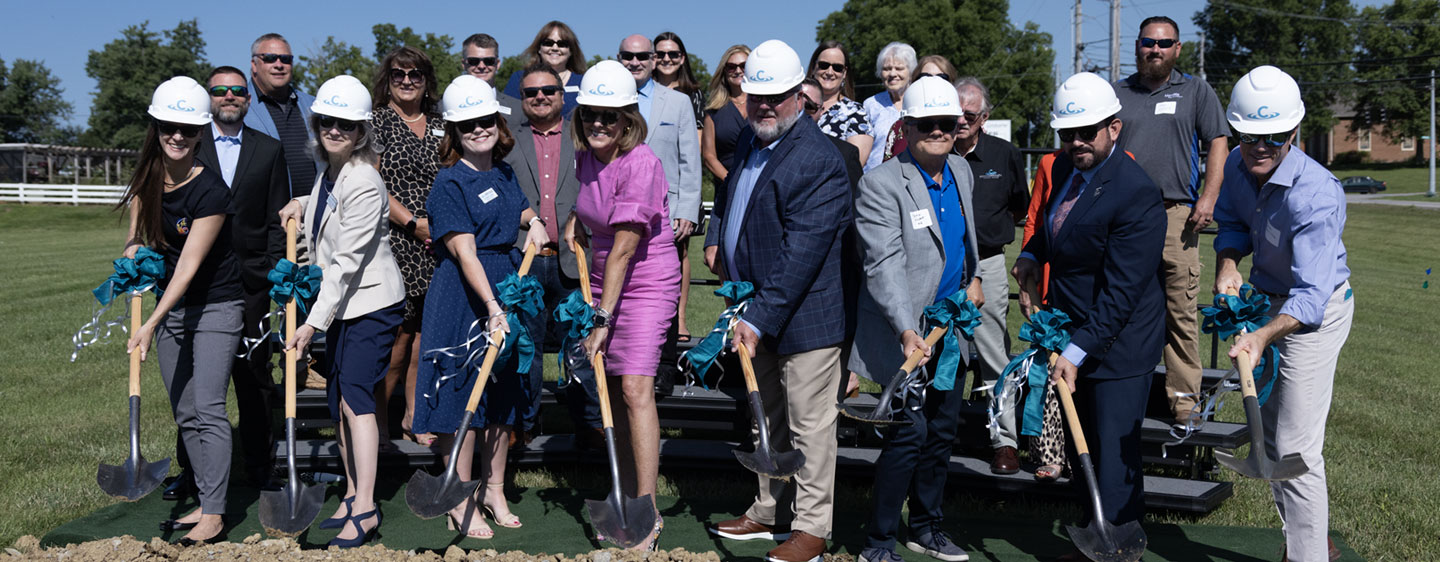 Photo of a team of CCU leaders breaking ground in a new location.
