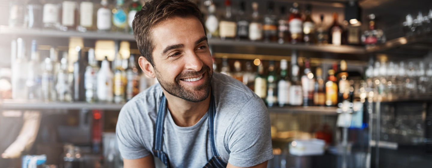 Image of man working behind a counter