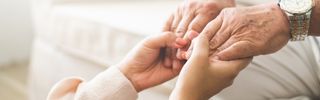 Elders holding hands (320X100)