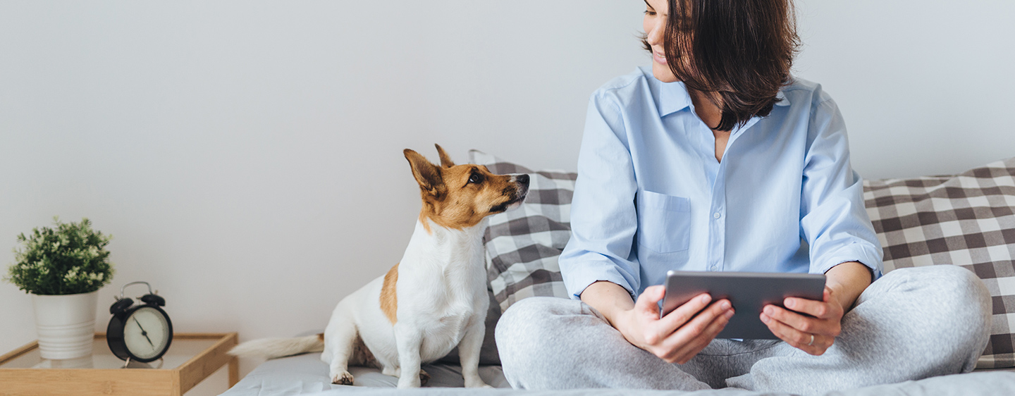 Woman looking at her dog.