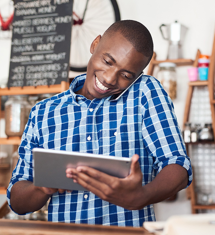 Business owner on tablet.