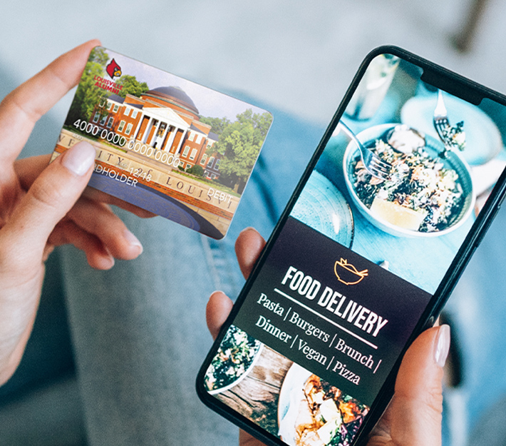 Person on a food app ordering food using their U of L debit card.