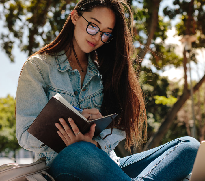 Student checking over her notes.