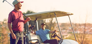 Image of two men golfing.