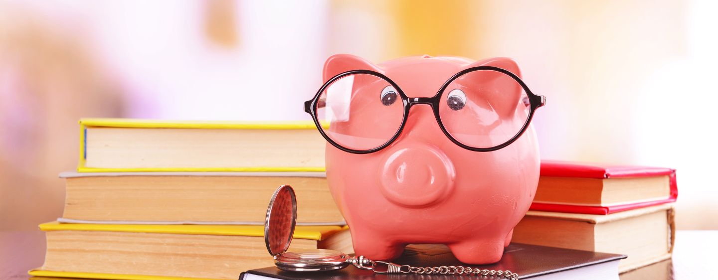 Piggy bank with glasses on.