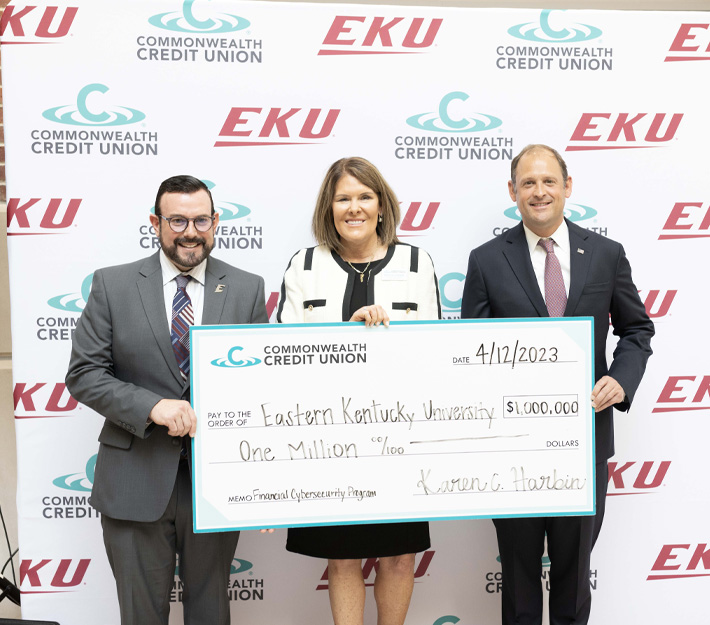 Karen Harbin presents a check to EKU