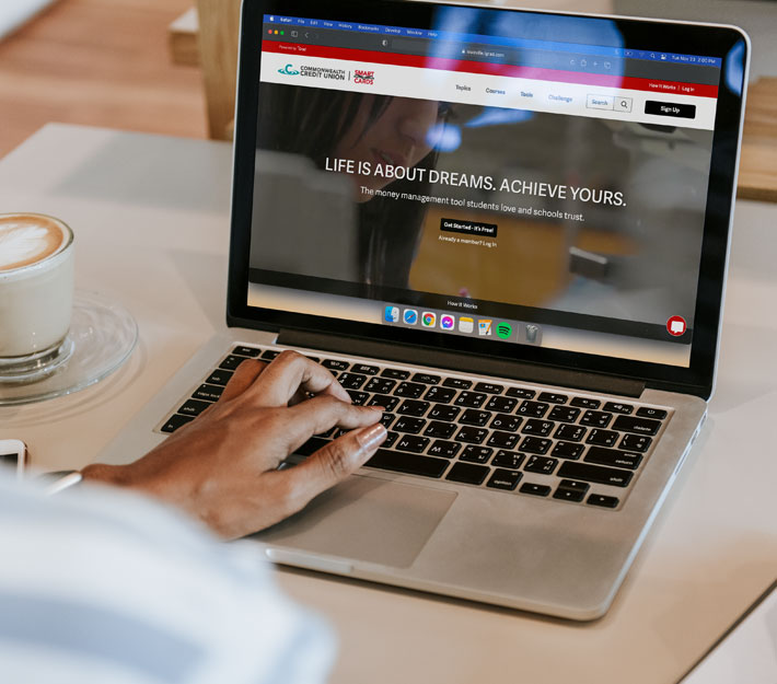 Image of someone using a laptop