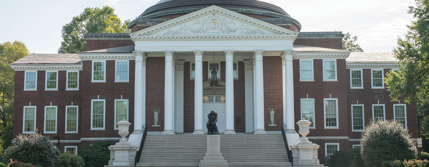 Picture of U of L building and Thinking Man statue.